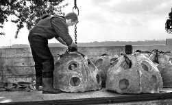 The artificial reefs are lifted into the water